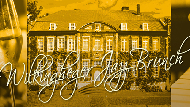 jazzbrunch_2025 Drei Personen der Familie Winnecken stehen auf einer weißen Brücke im Freien, zwei Männer in Anzügen und eine Frau in einem gemusterten Kleid.